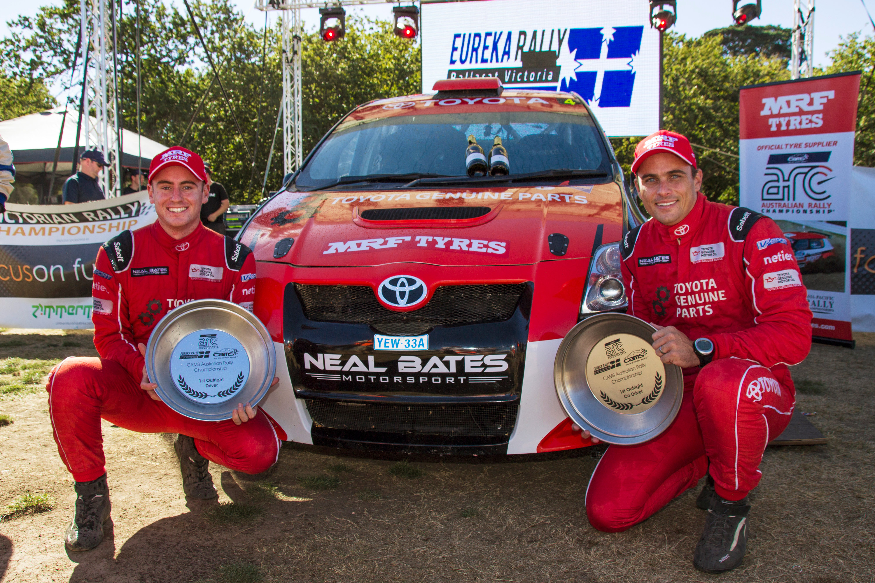 Harry Bates (left) and co-driver John McCarthy celebrate victory at the season-opening Eureka Rally.